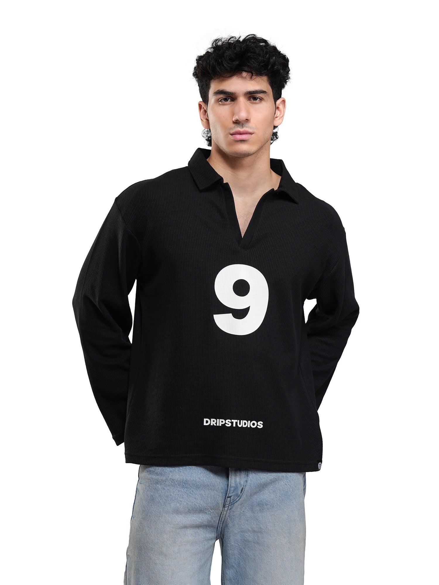 Black long-sleeve polo shirt with centered white '9' graphic and 'DRIPSTUDIOS' logo