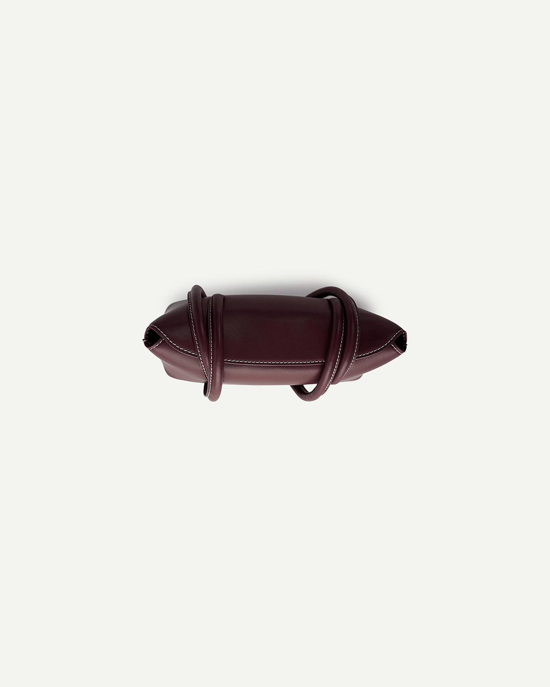 Burgundy leather-look bag with gathered detail and short strap at side
