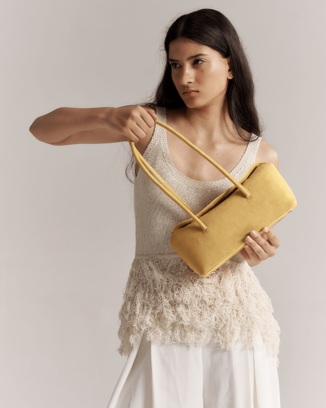Mustard yellow suede tote bag with crossed top handles