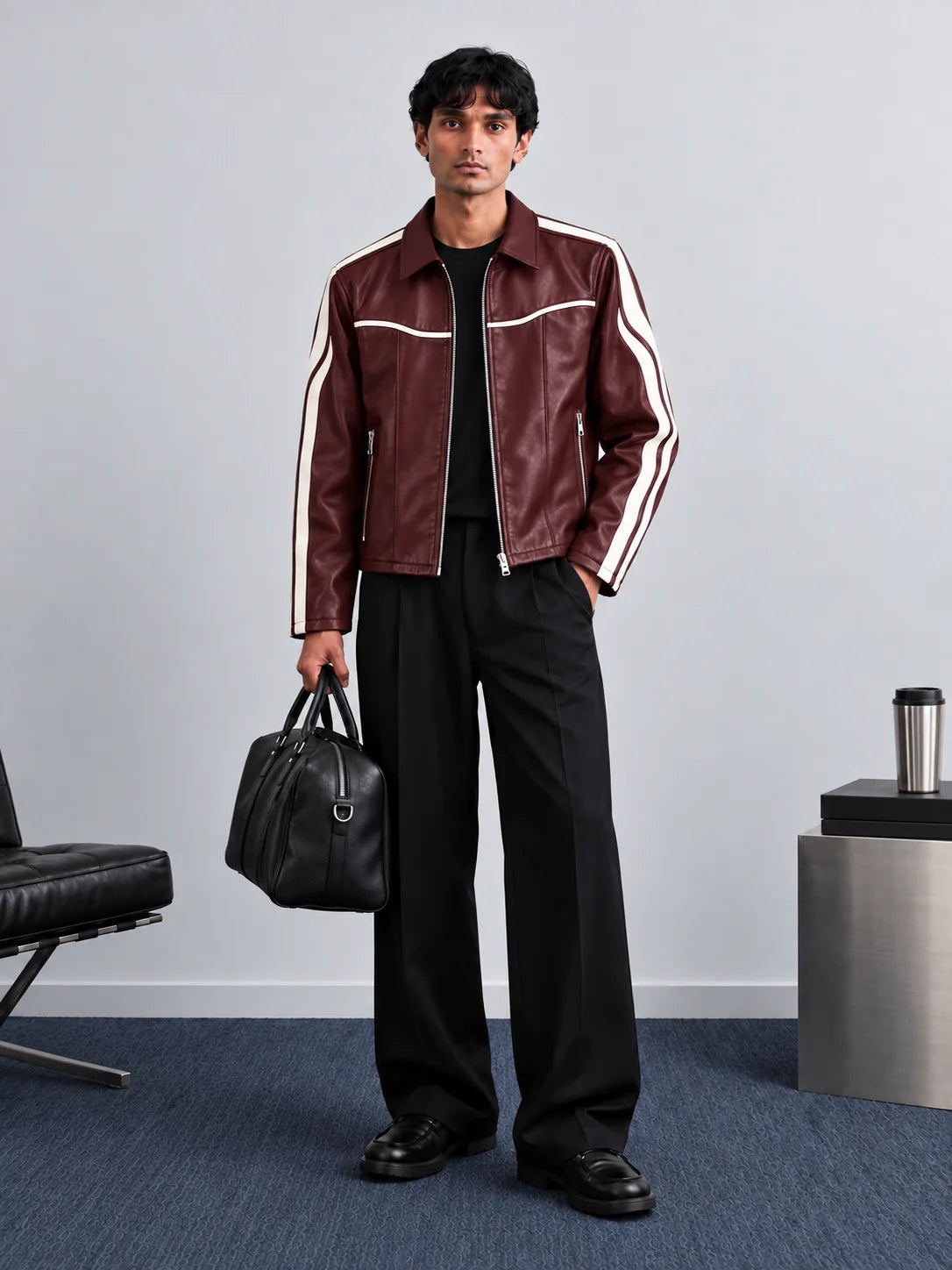 Burgundy leather jacket with white sleeve stripes, worn with black pants