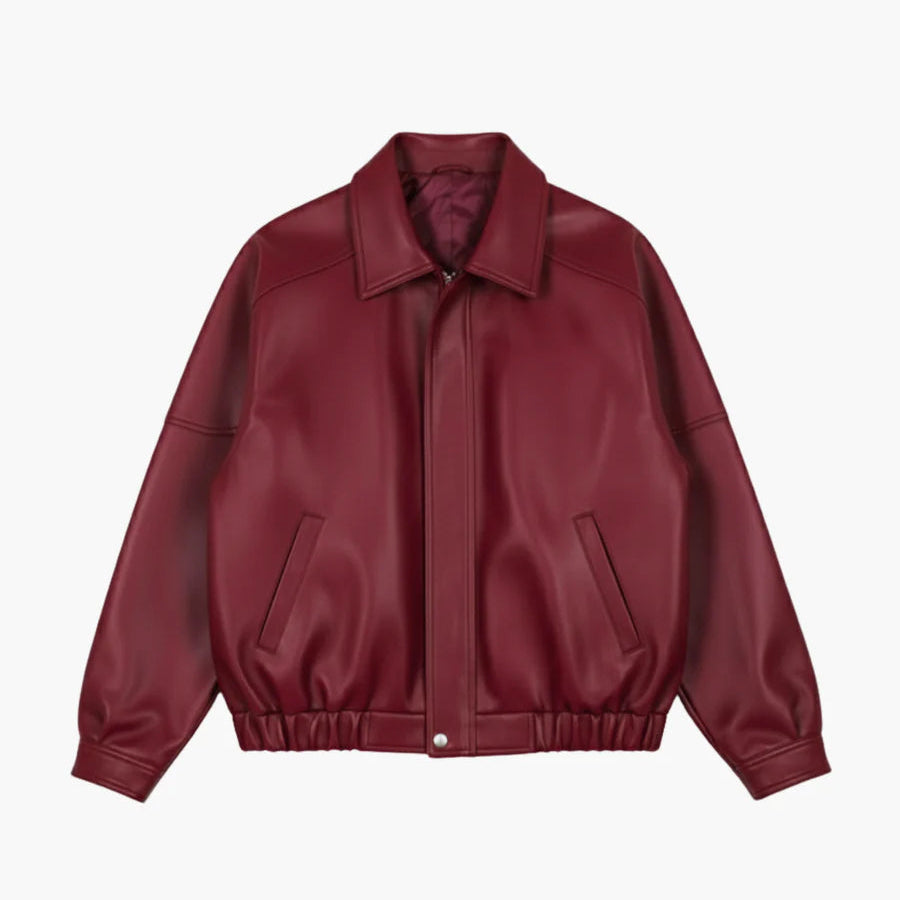 Cherry red leather jacket close-up with zip front, stand collar, welt pockets