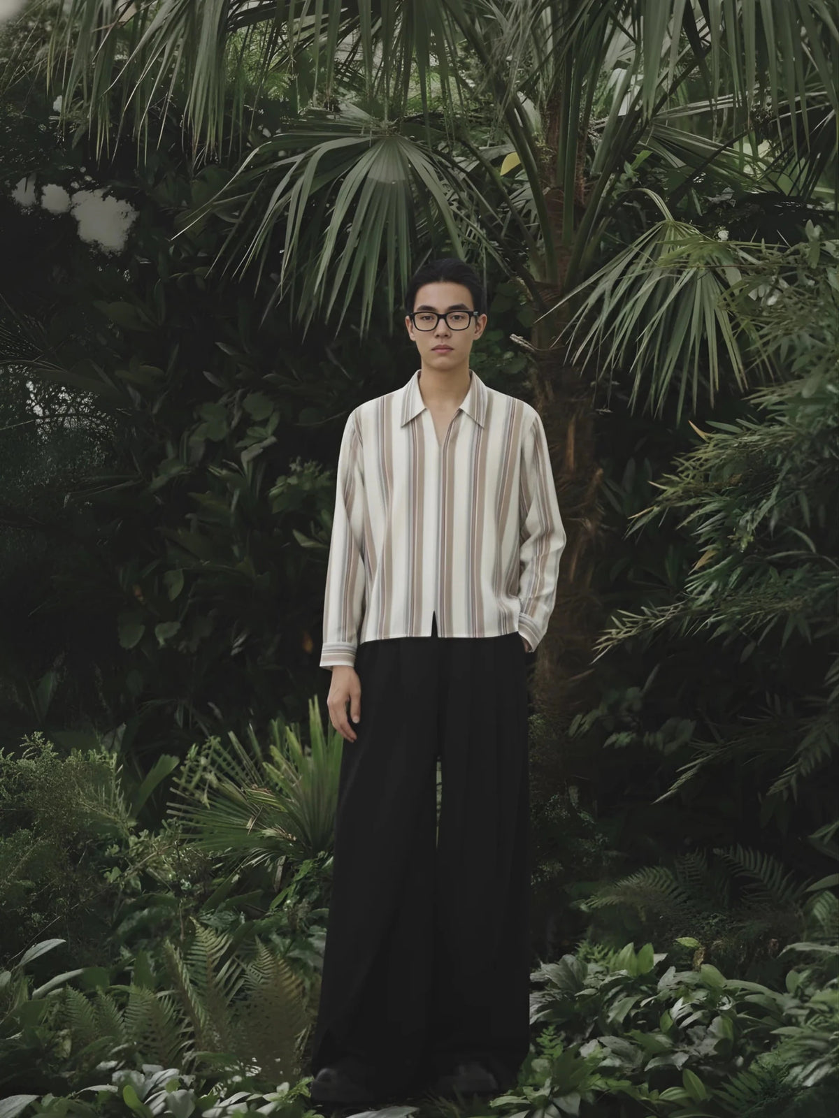 Front view cream striped boxy shirt with vertical tan and blue lines, button-front, long sleeves