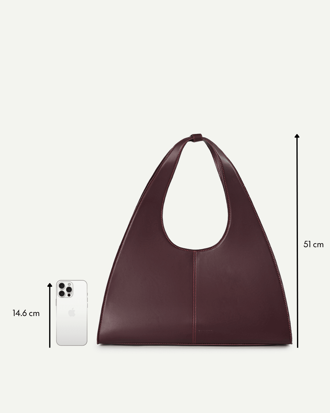 Burgundy leather open-top tote bag with top handle and contrast red stitching