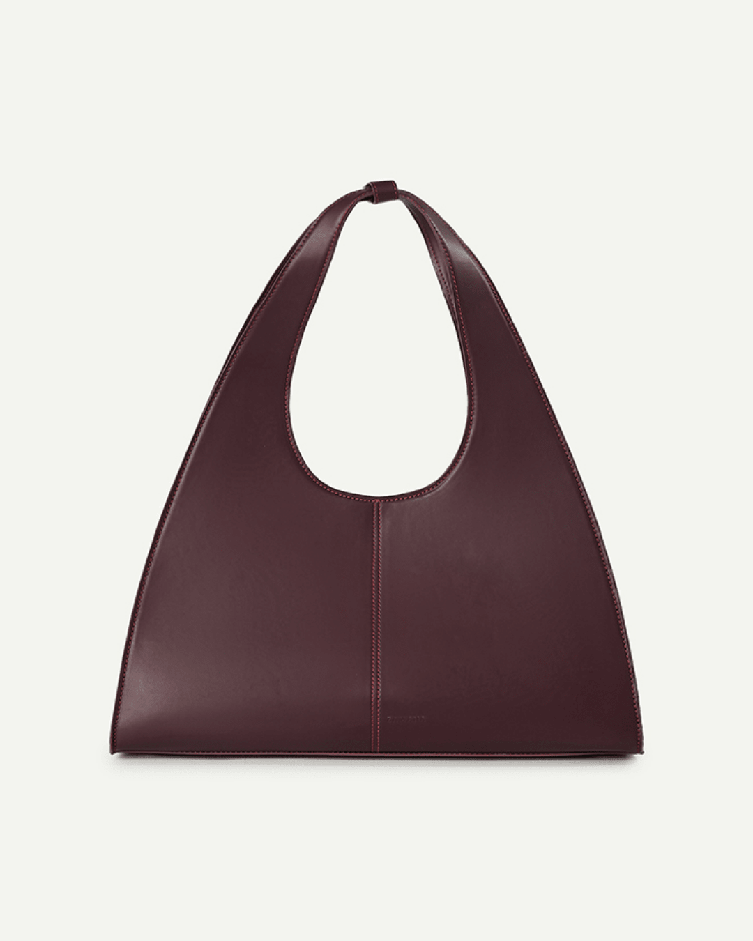 Burgundy leather open-top tote bag with top handle and red contrast stitching, front view