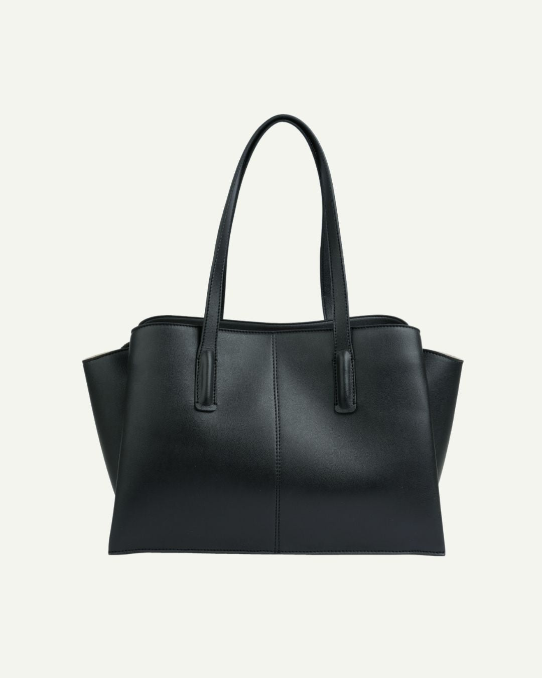 Black tote bag with two top handles and centered logo plaque, angled front view.