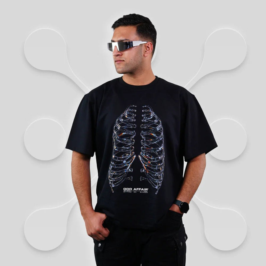 SITTING ON BLADES T-SHIRT