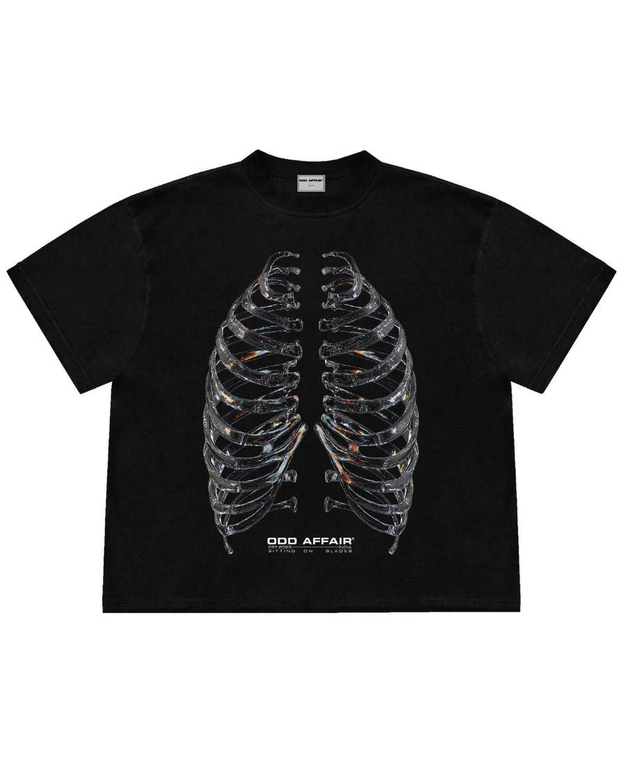SITTING ON BLADES T-SHIRT