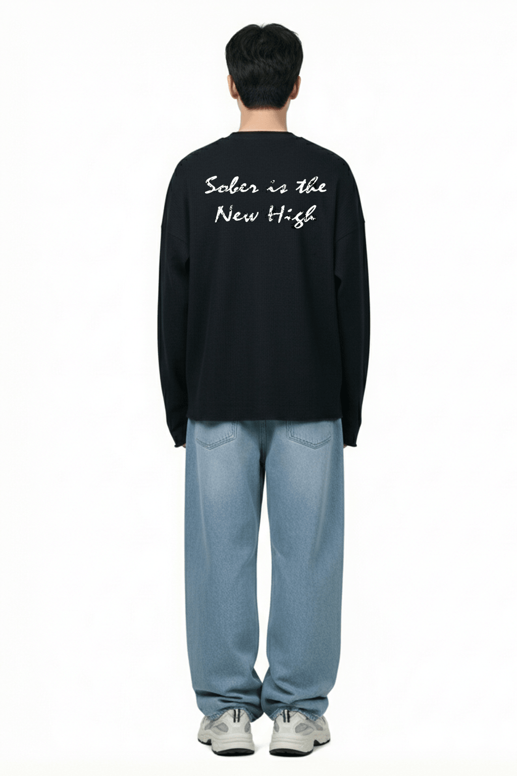 Black waffle-knit crewneck sweatshirt with large back graphic text.