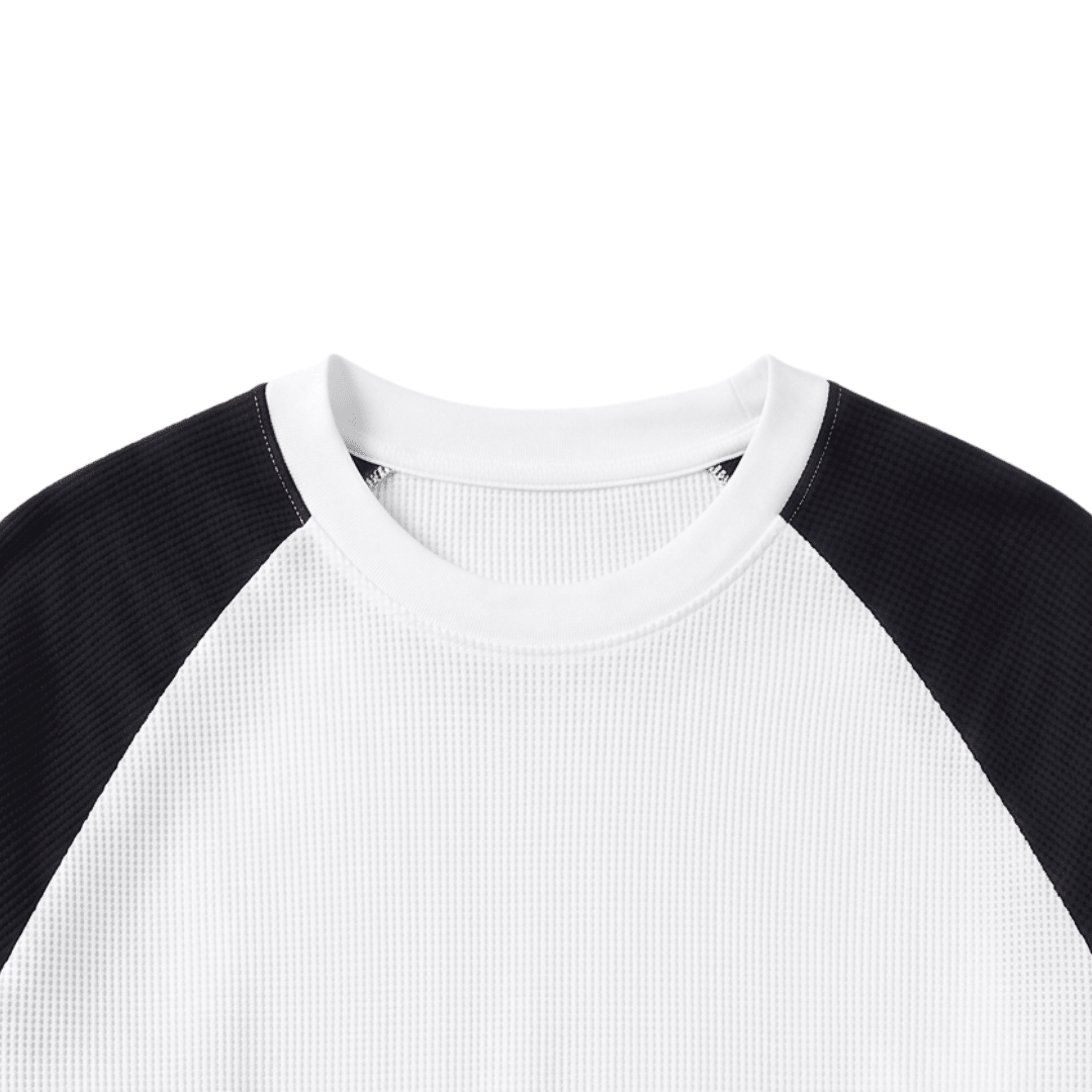 White waffle knit raglan crewneck long-sleeve with black sleeves