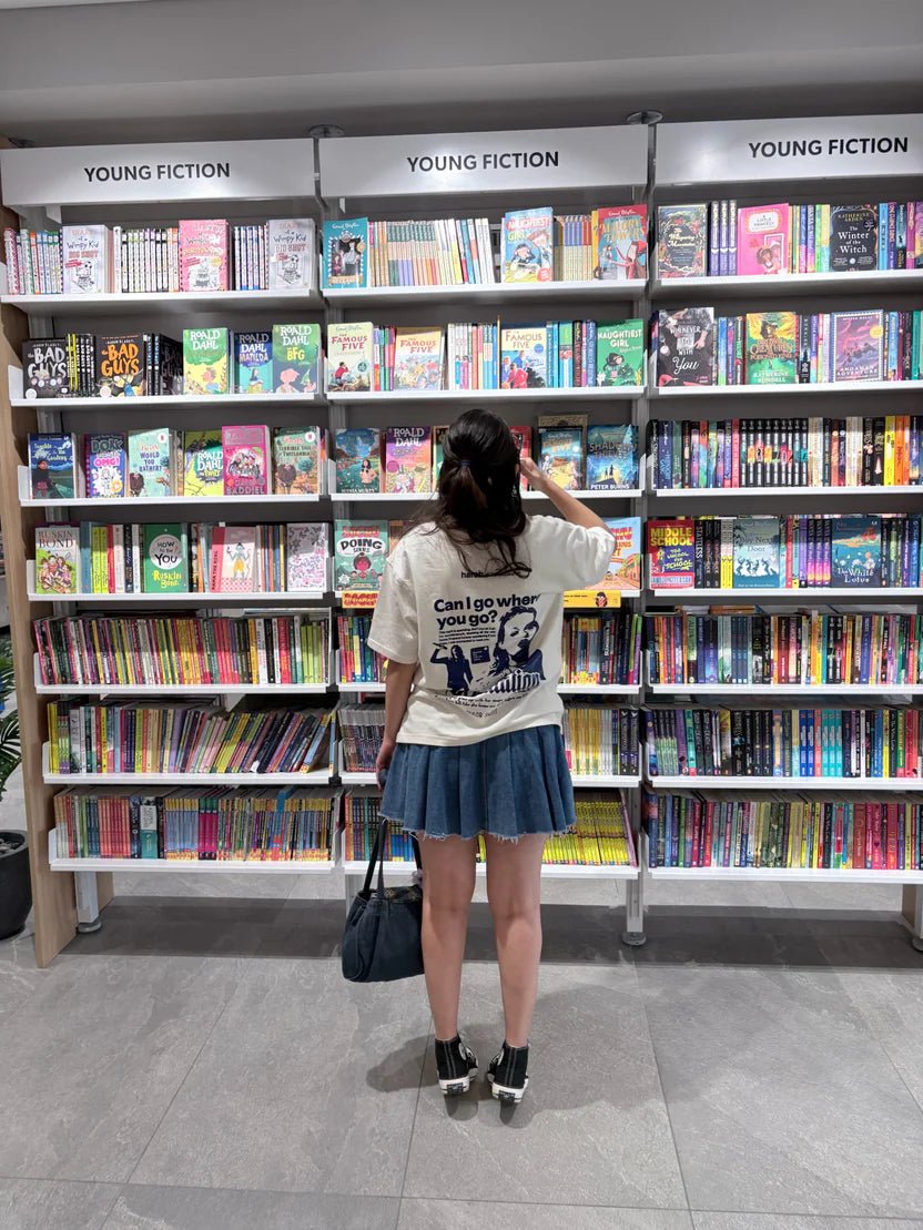 Cream graphic band T-shirt with front print and short sleeves.