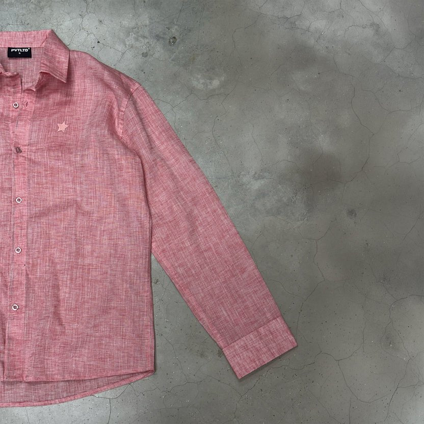 Peach button-up shirt sleeve with cuff and small chest star detail