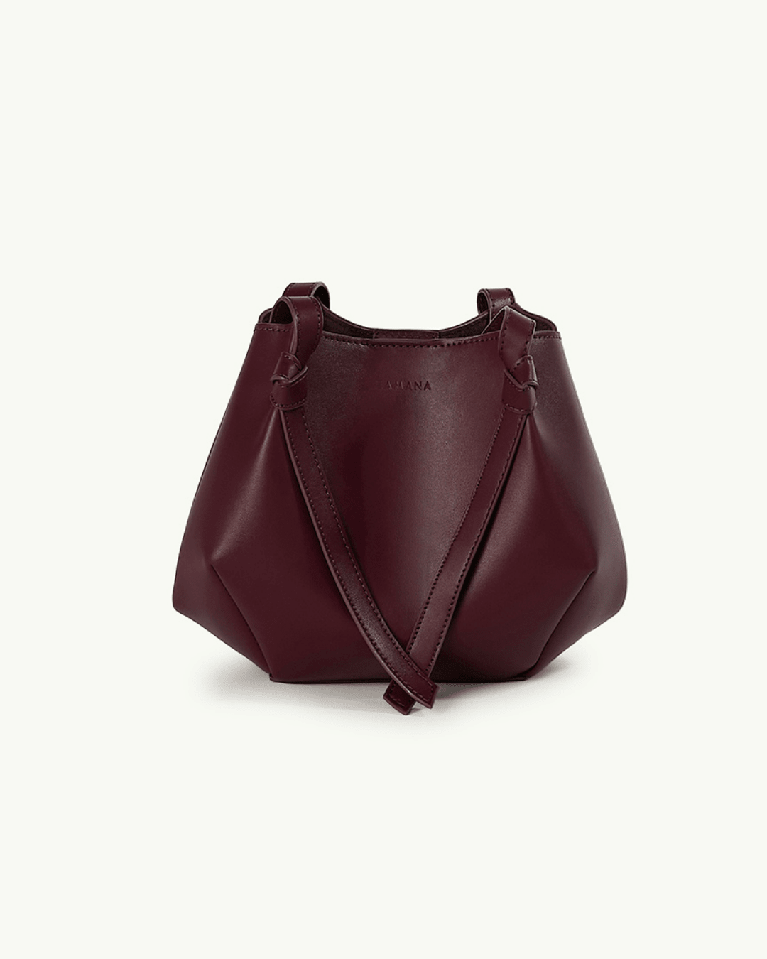 Burgundy leather structured tote bag with double handles and front seam