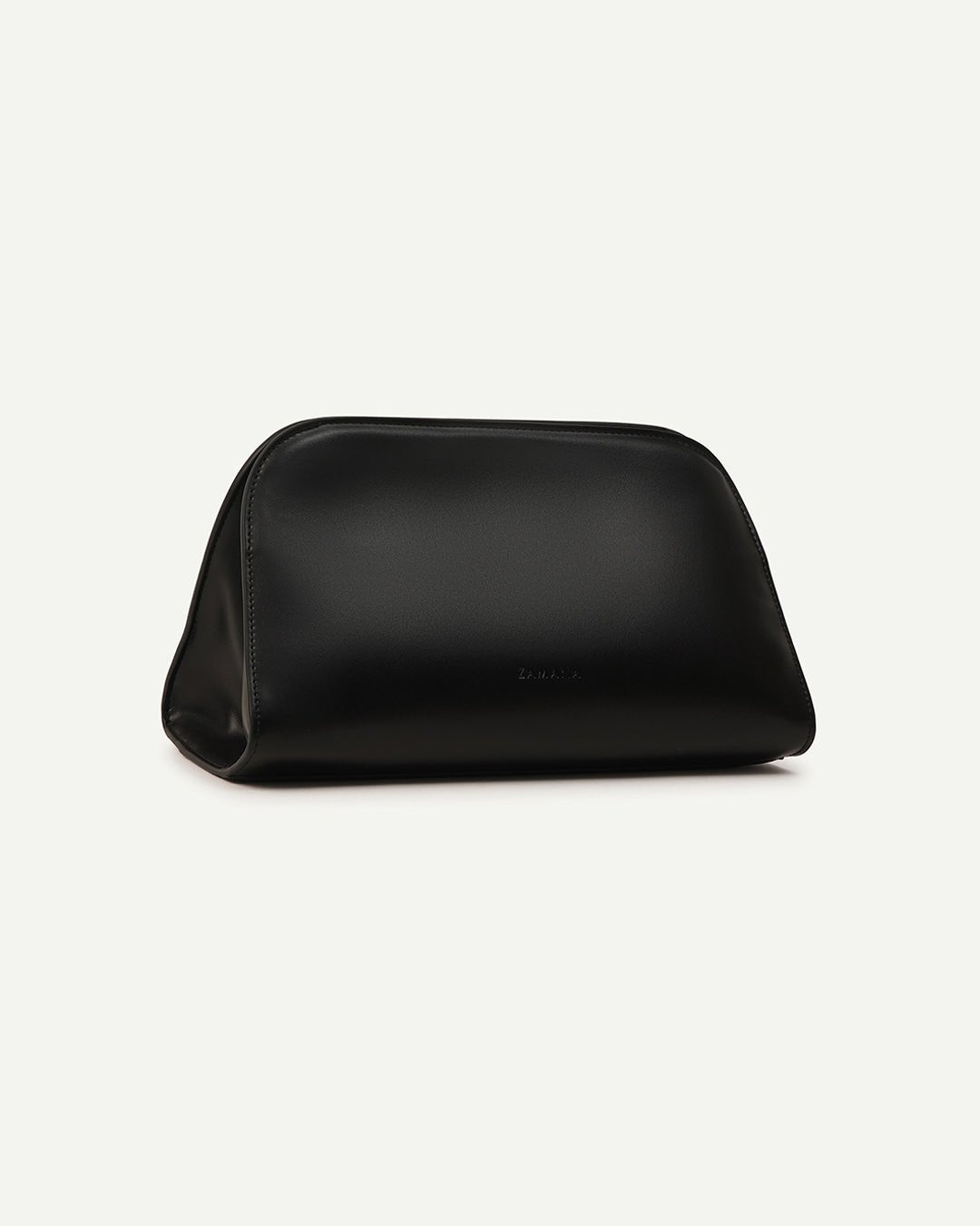 Black leather mini bag with curved top and single side handle on a flat base.