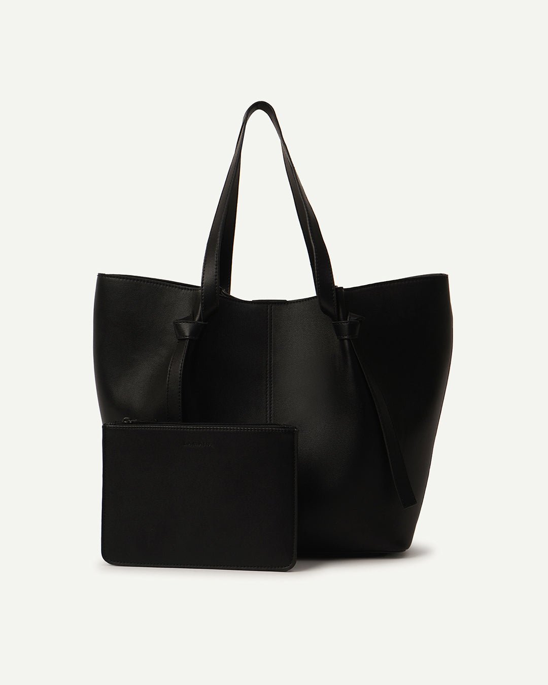 Black leather tote bag with front pocket panel and top handles