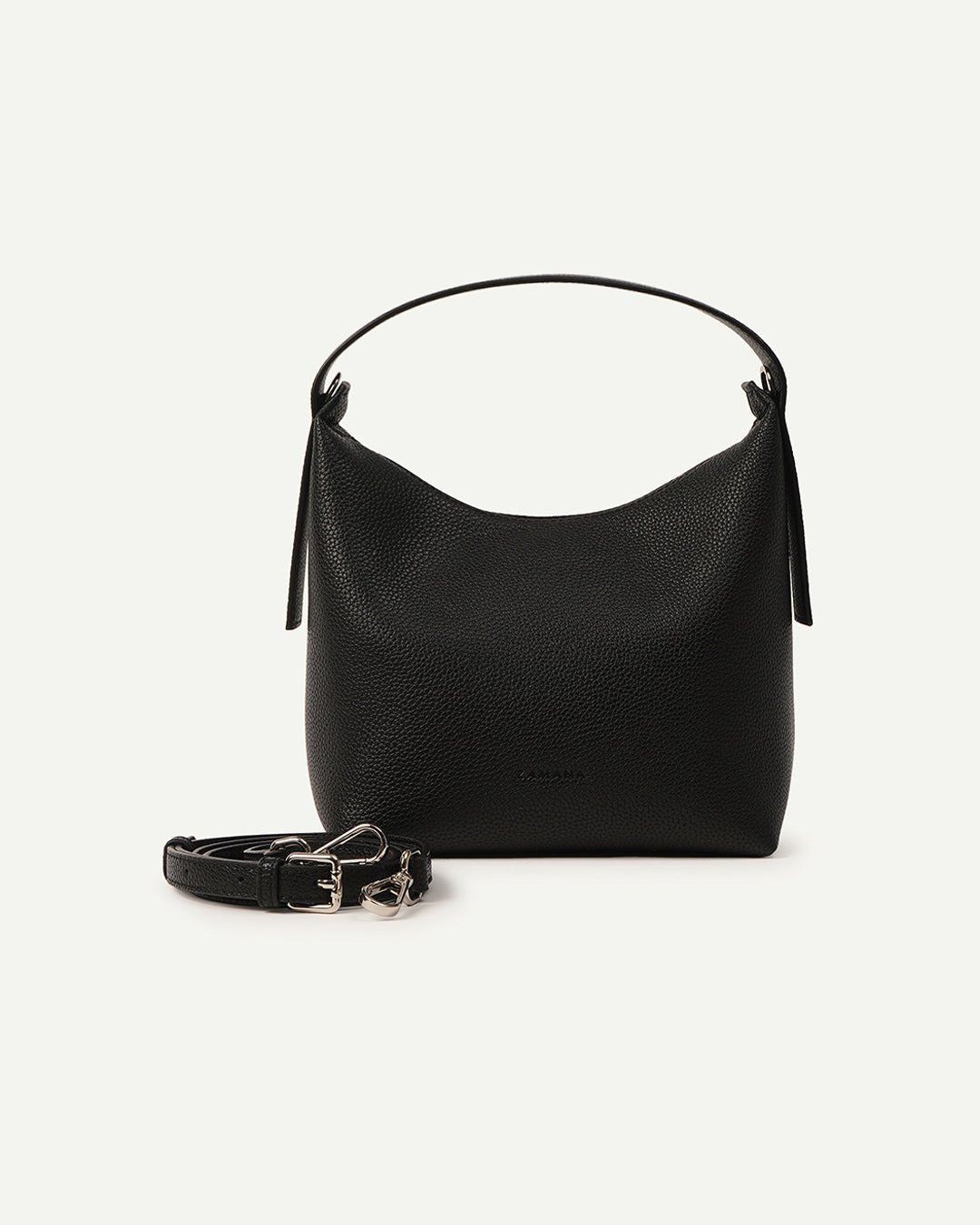 Black hobo bag with detachable crossbody strap and tassel pull tabs