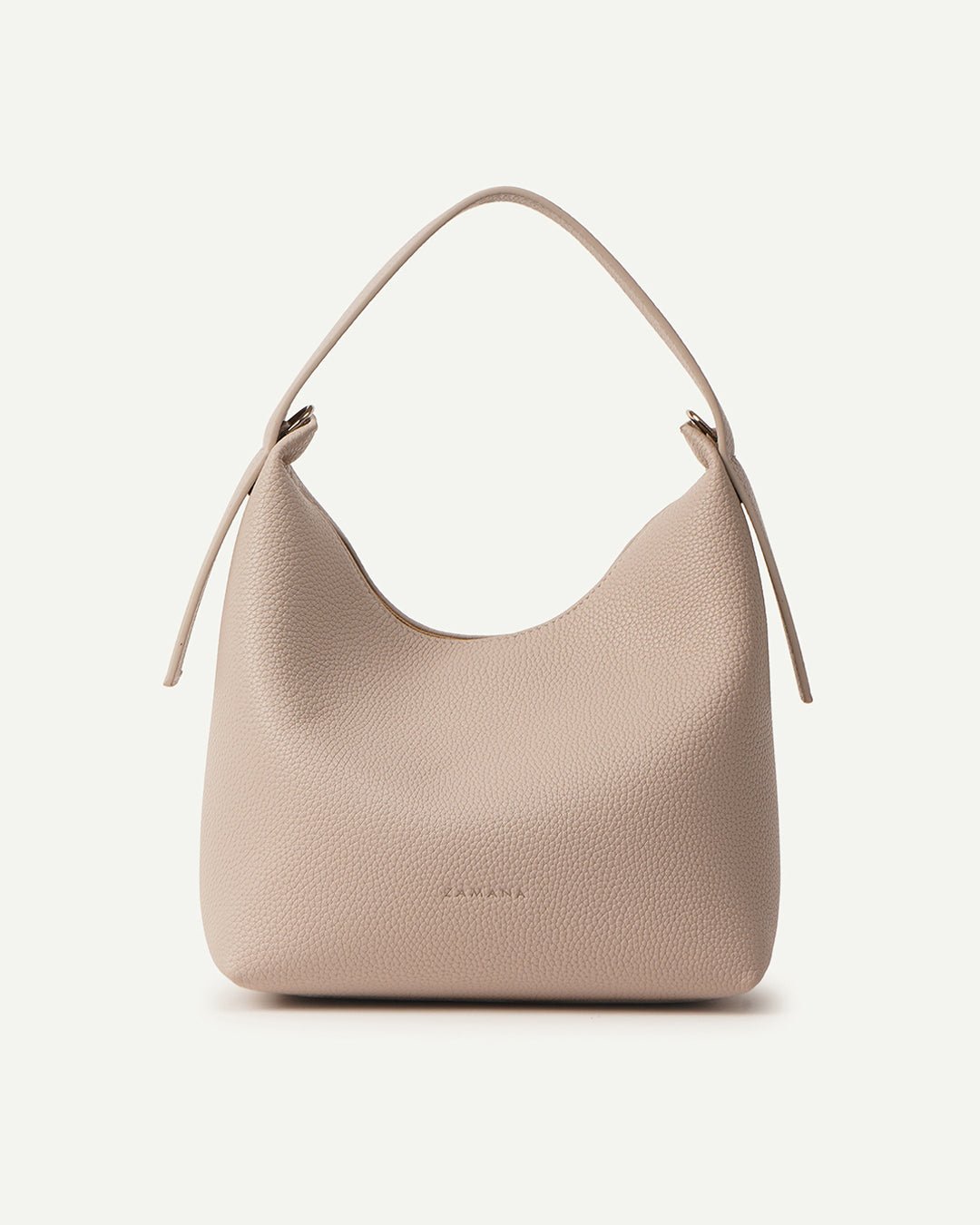 Cream hobo handbag angled front view with curved top handles and side ties