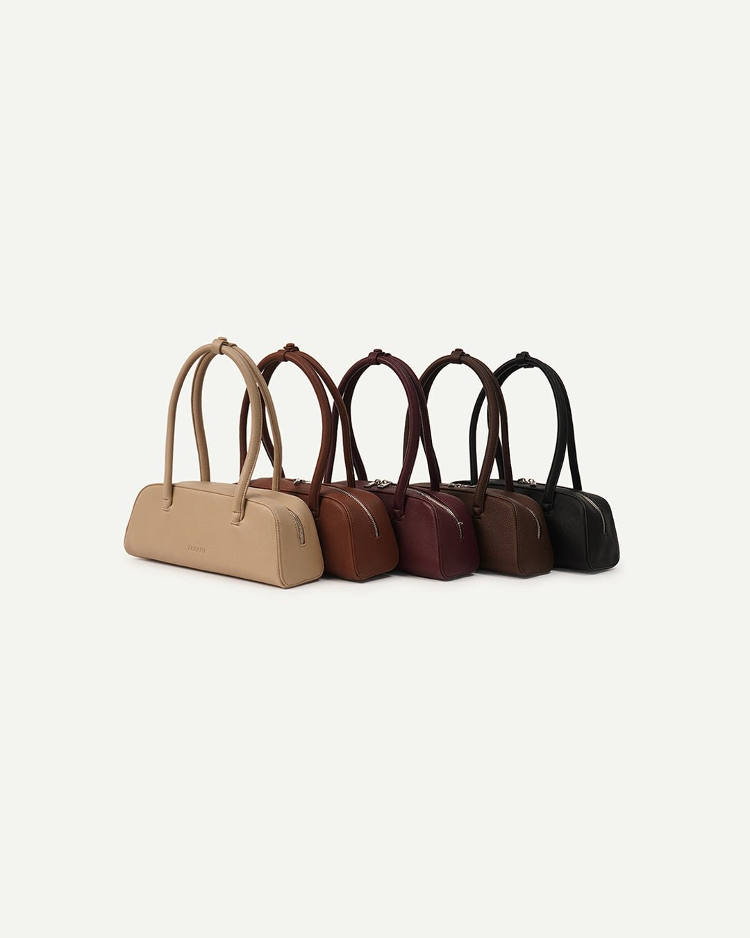 Assorted color top-handle handbags with short handles and zip closures