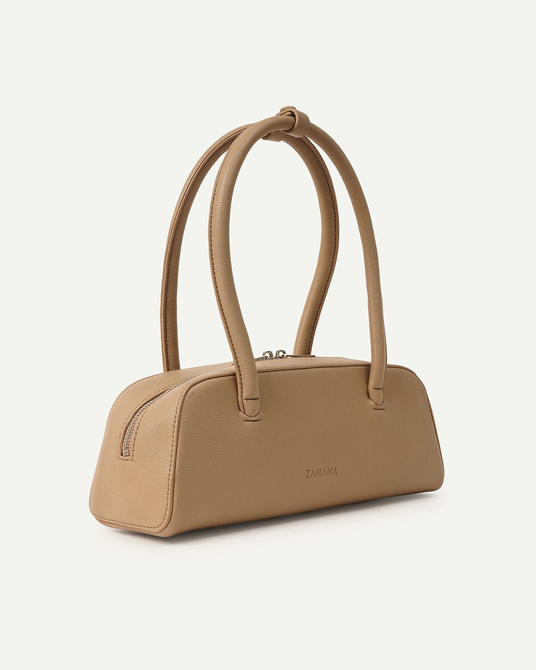 Cream/tan structured top-handle handbag with stitched side seam details