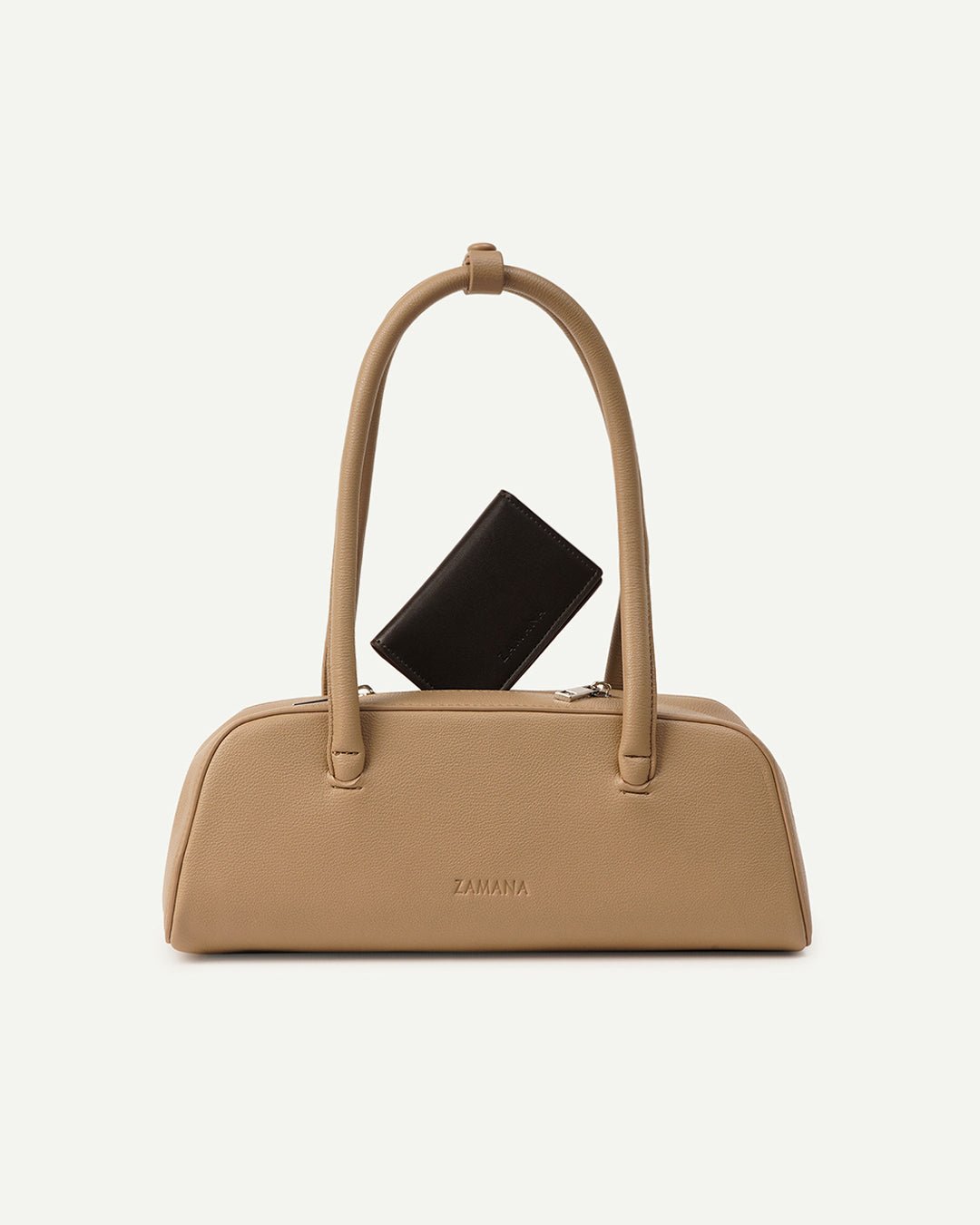 Cream/tan handbag with top handles and a black card accessory inside