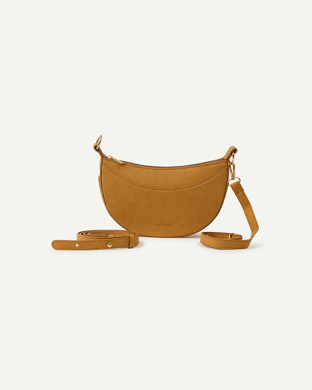 Caramel crescent crossbody bag with detachable strap pieces and gold-tone hardware