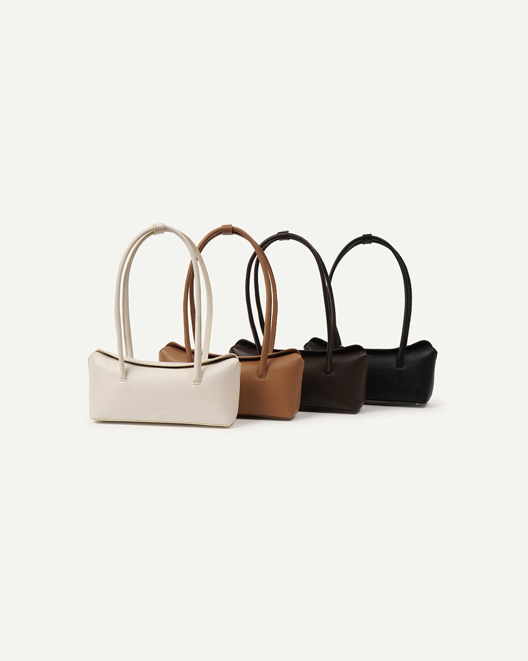 Set of mini tote bags with rounded handles in white, caramel, and dark colors