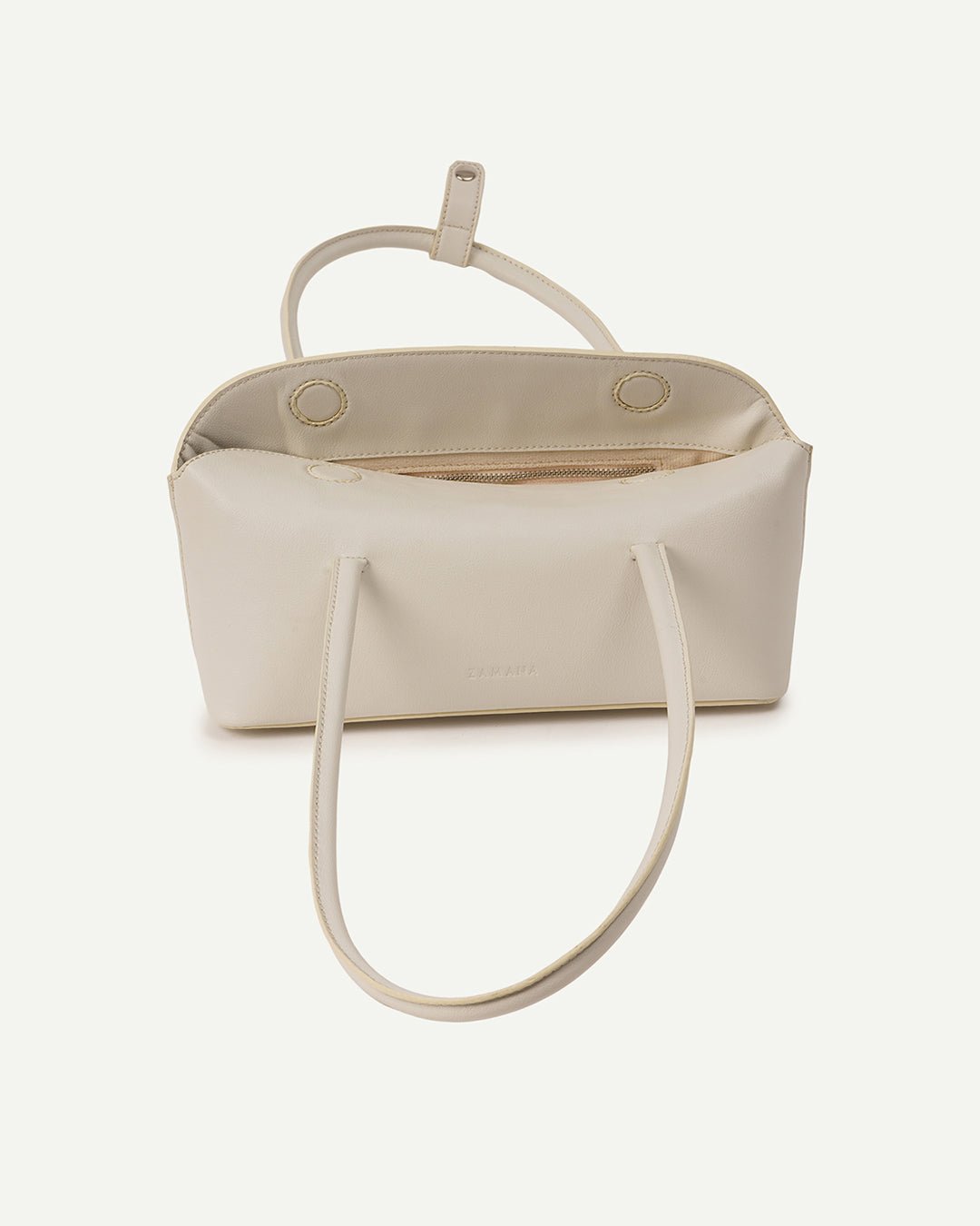 Cream tote bag with open top showing interior lining and handle straps
