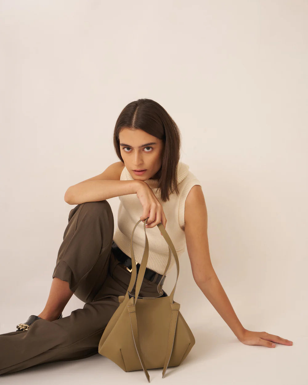 Olive drawstring tote bag with braided handles and gathered top