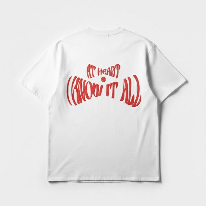 White crew-neck T-shirt with large red stylized lettering graphic on the chest.
