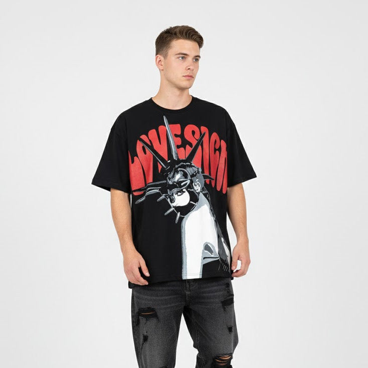 Black crewneck T-shirt with red and white character graphic on front.