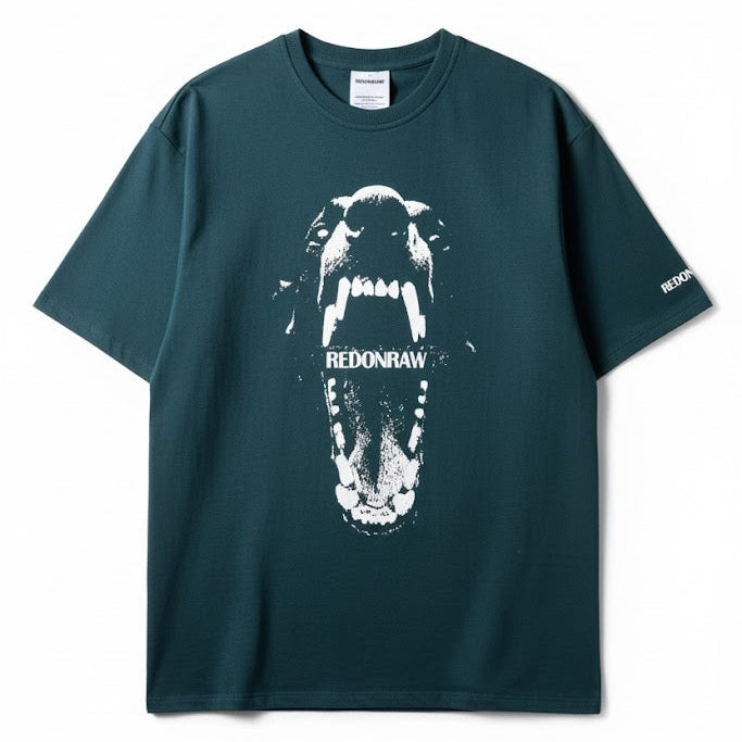 Sea green T-shirt featuring large white monster graphic and REDONRAW on front