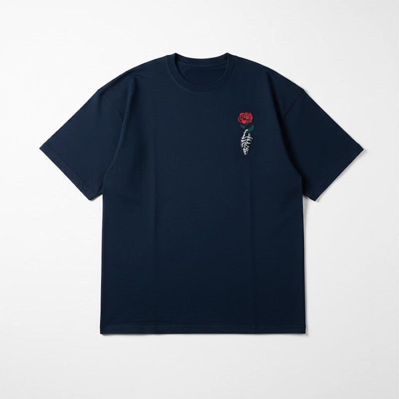 Dark blue crew-neck T-shirt, rose-and-skeleton embroidery at upper right chest
