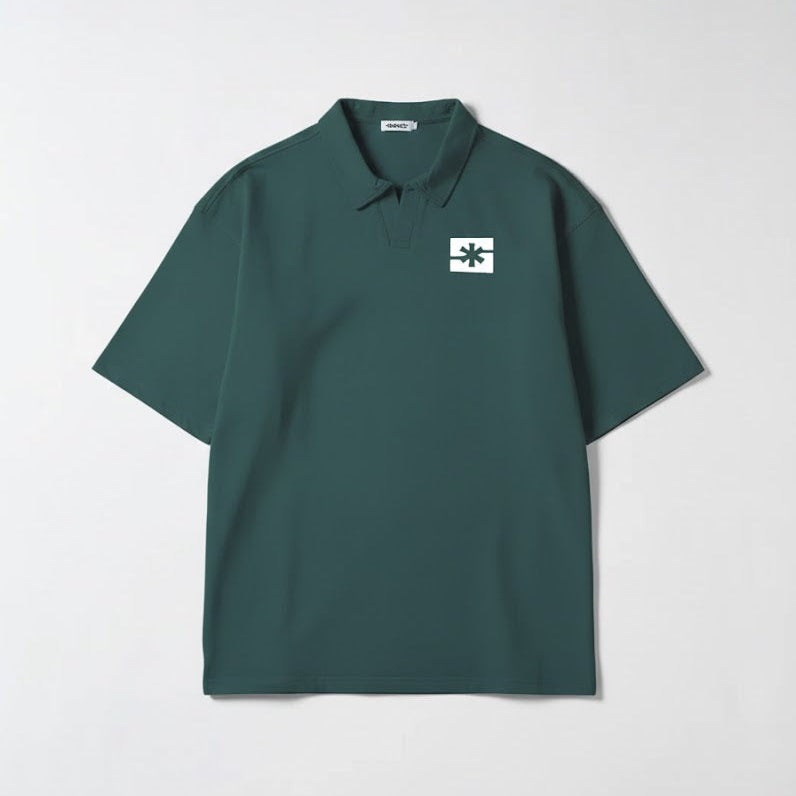 Forest green polo shirt with collar and white logo patch on chest