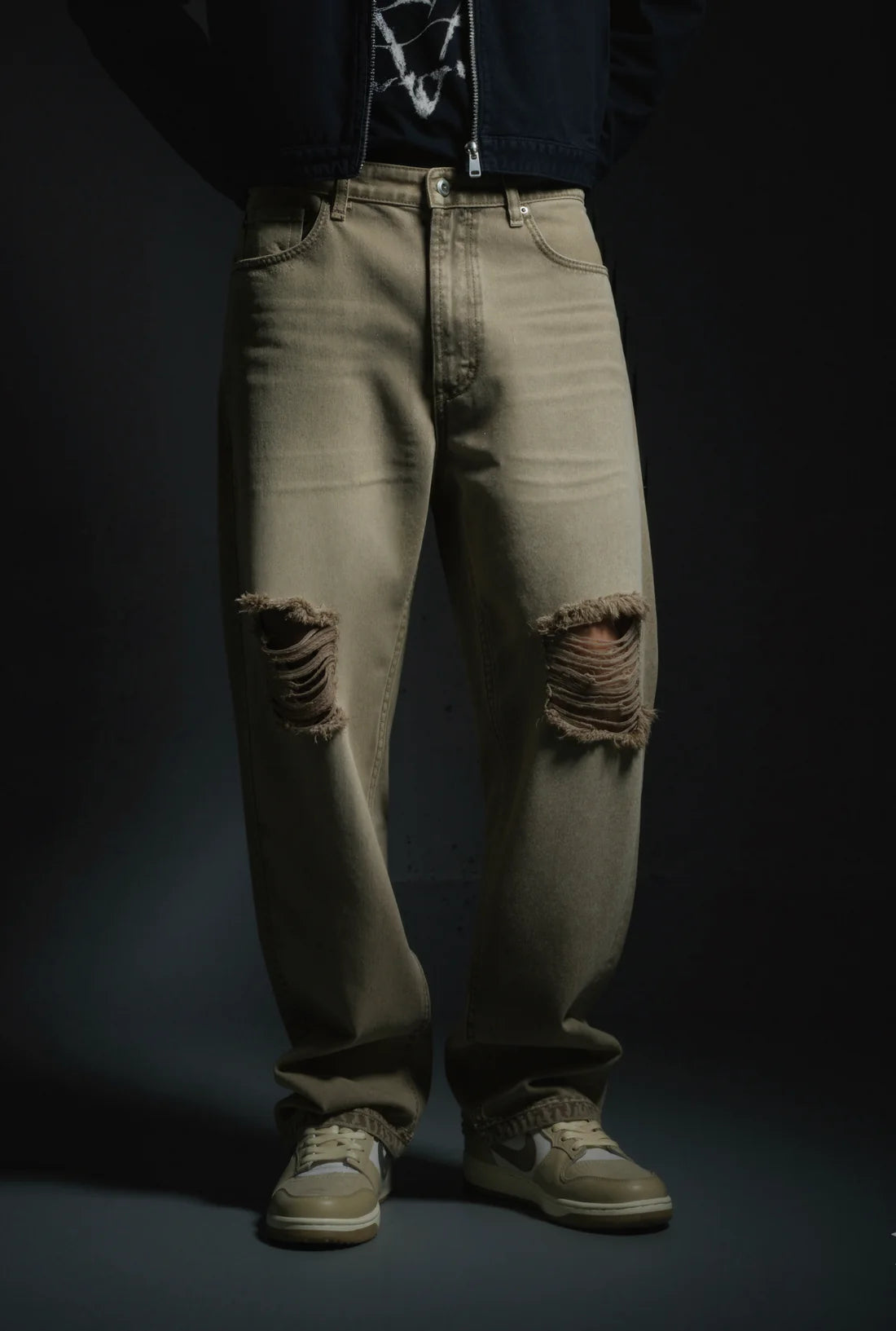 Sand-wash olive baggy denim jeans with torn knees, button fly, relaxed straight fit.