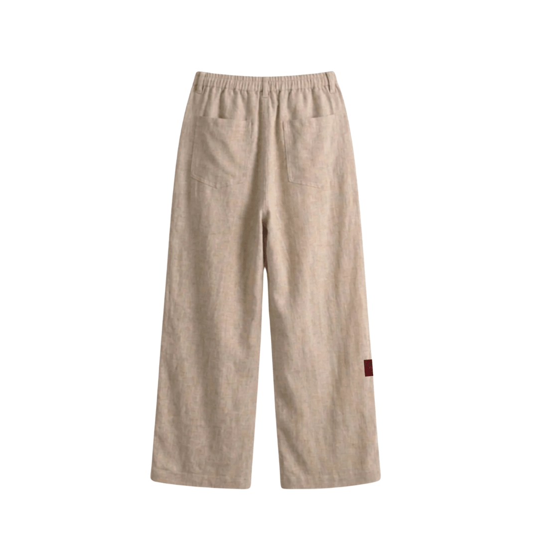 Light beige linen pants with elastic drawstring waistband, relaxed wide-leg fit