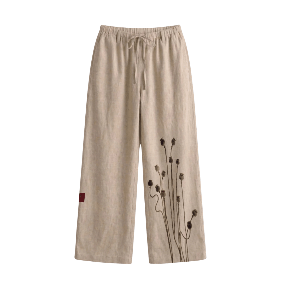 Light beige linen pants with floral stems print on front, elastic drawstring waist