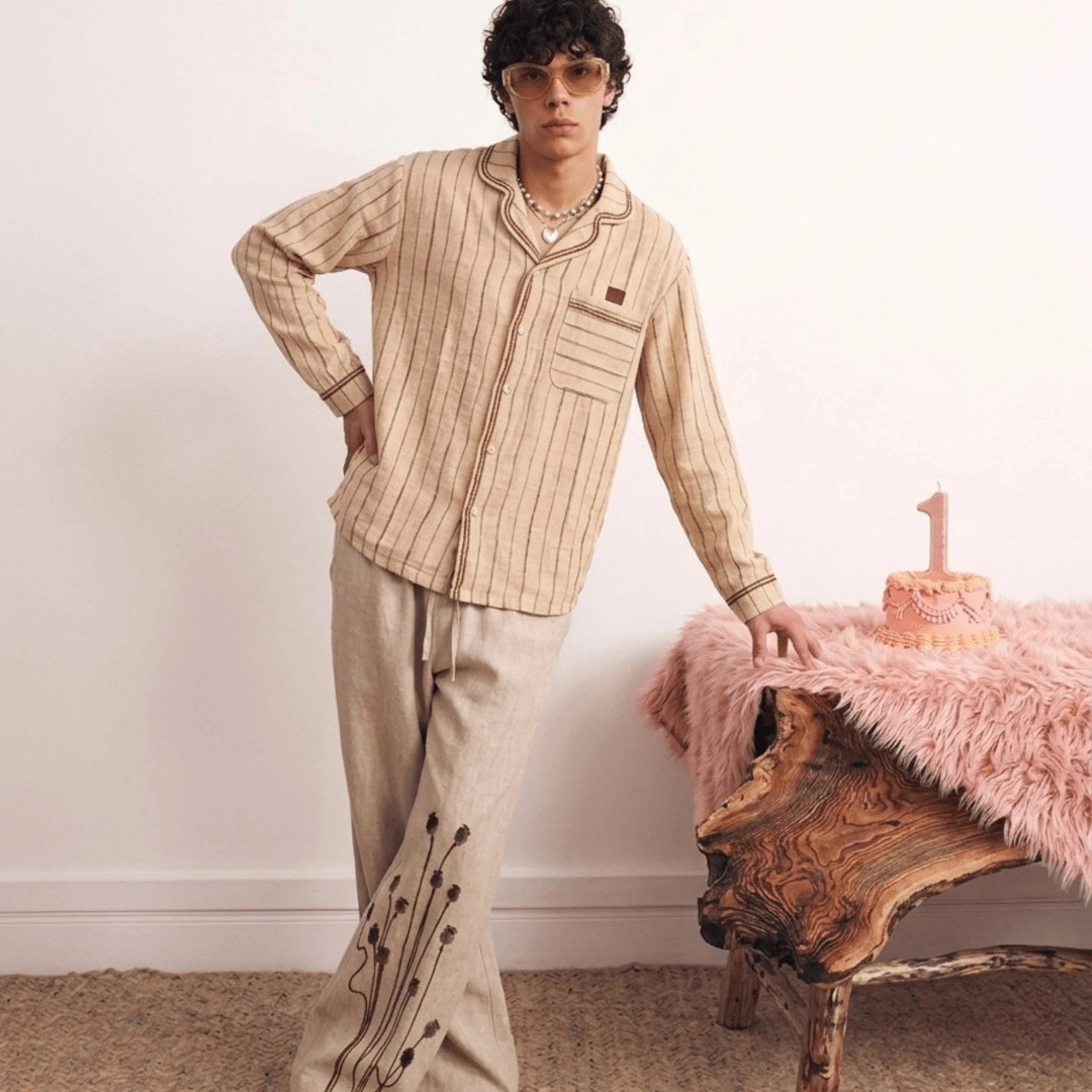 Light beige linen pants with elastic waist and floral print, wide-leg straight cut