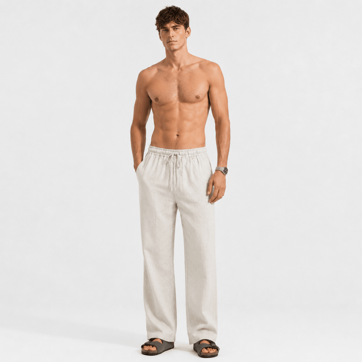 Off-white linen drawstring pants on model, wide straight-leg fit with elastic waist.