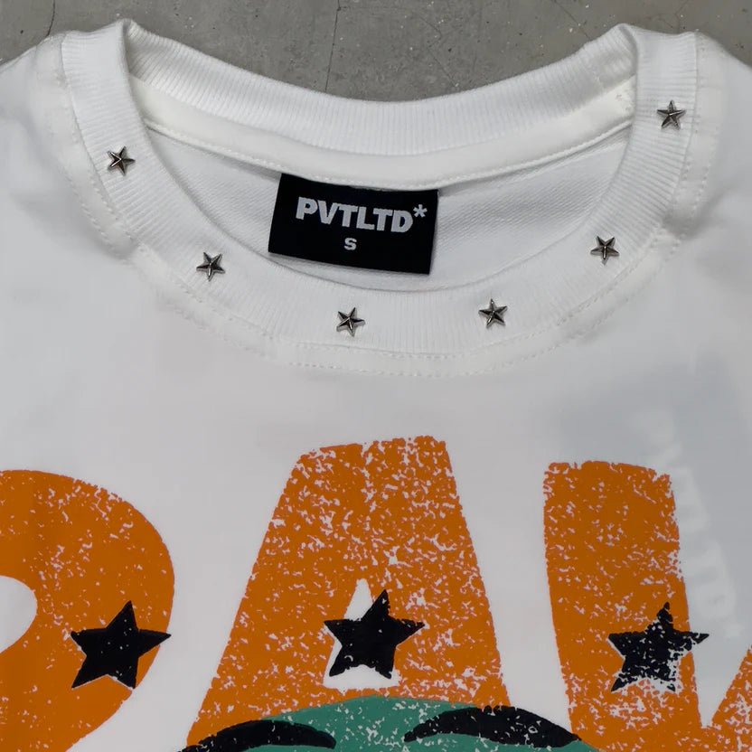 White crew-neck vest with small star studs and PVTLTD label at chest
