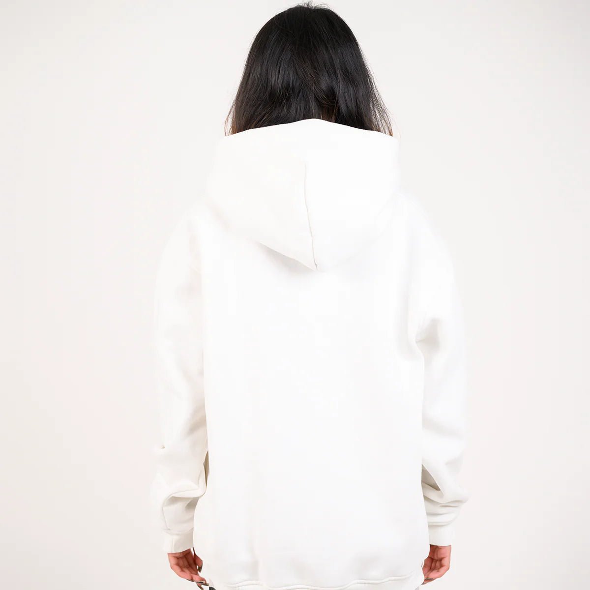 White pullover hoodie with hood, back view showing full silhouette.